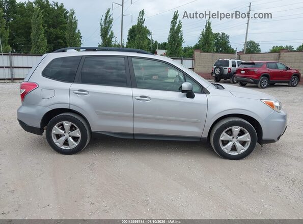 JF2SJADC5GG465165 2016 SUBARU FORESTER Silver უკანა სალონის ხედი