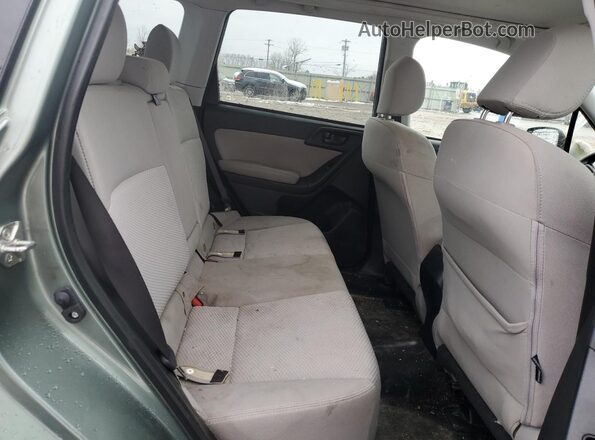 JF2SJADC5GH426196 2016 SUBARU FORESTER Green Vista interior trasera