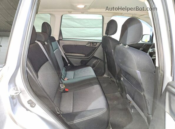 JF2SJADC5GH452913 2016 SUBARU FORESTER Silver Rear seats view