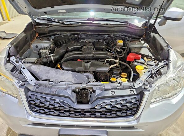 JF2SJADC5GH452913 2016 SUBARU FORESTER Silver Rear interior view