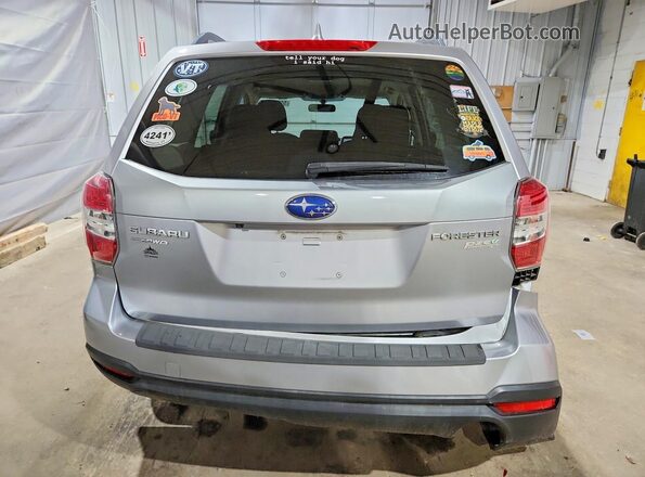 JF2SJADC5GH452913 2016 SUBARU FORESTER Silver Rear view