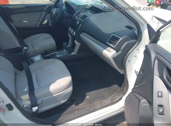 JF2SJADC5GH488911 2016 SUBARU FORESTER White Vista interior delantera