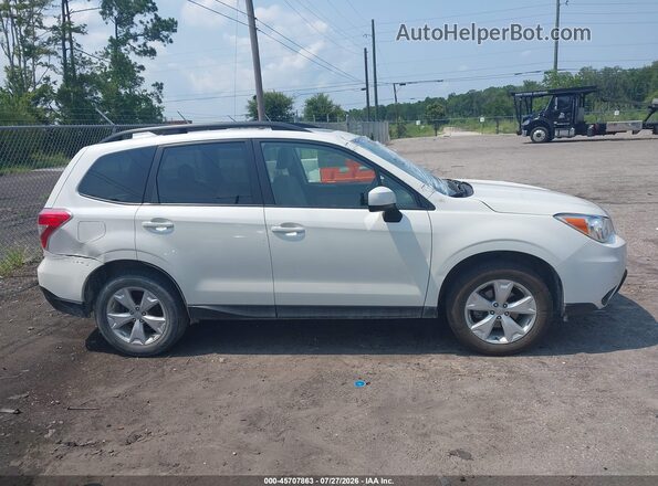 JF2SJADC5GH488911 2016 SUBARU FORESTER White Vista interior trasera