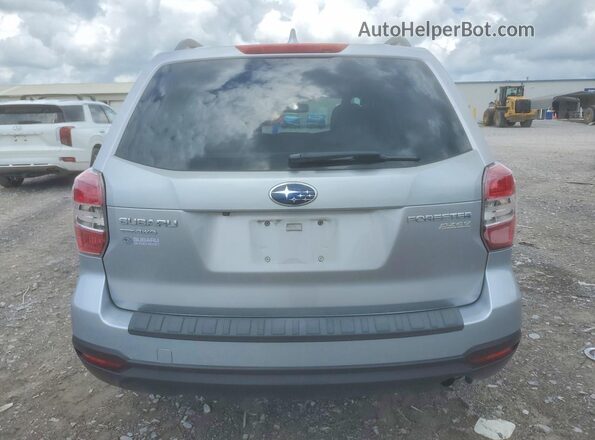 JF2SJADC6GH471003 2016 SUBARU FORESTER Silver Rear view