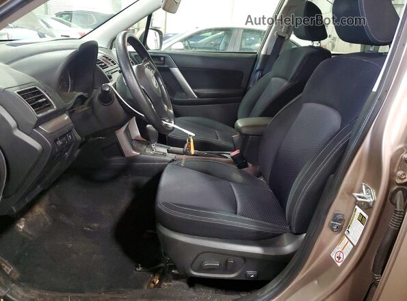 JF2SJADC6GH506736 2016 SUBARU FORESTER Brown Front interior view