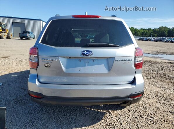 JF2SJADC6GH557167 2016 SUBARU FORESTER Silver Rear view