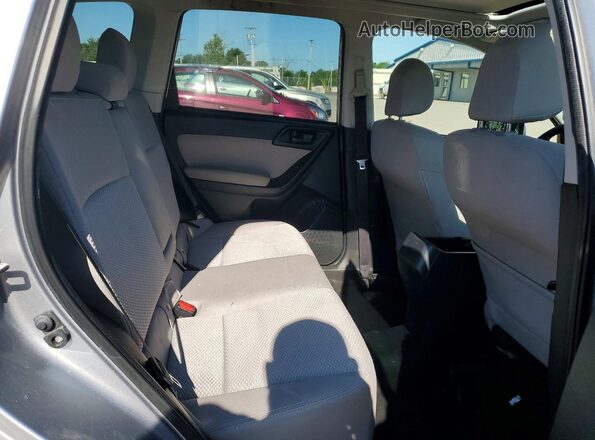 JF2SJADC6GH557167 2016 SUBARU FORESTER Silver Rear interior view