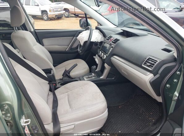 JF2SJADC6GH557816 2016 SUBARU FORESTER Green Vista interior delantera