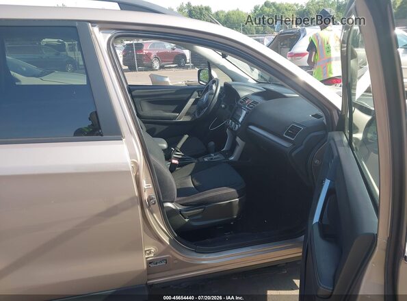JF2SJADC7GH427673 2016 SUBARU FORESTER Tan Front interior view