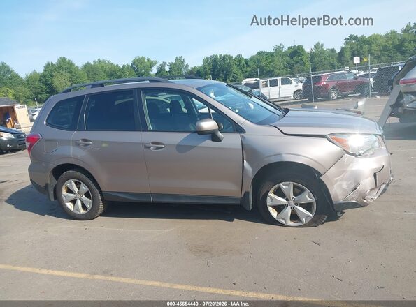 JF2SJADC7GH427673 2016 SUBARU FORESTER Tan Rear interior view
