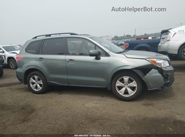 JF2SJADC8GH465378 2016 SUBARU FORESTER Зеленый Вид задней части салона