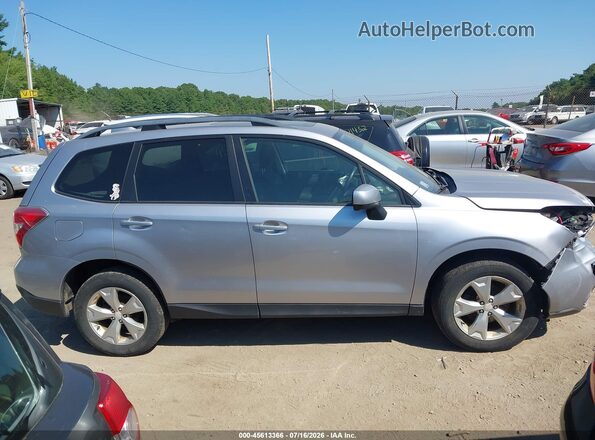 JF2SJADC9GH480259 2016 SUBARU FORESTER Серебряный Вид задней части салона