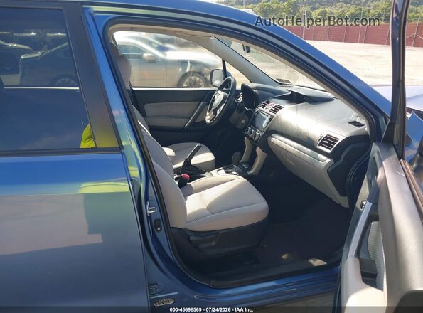 JF2SJAEC2HH522643 2017 SUBARU FORESTER Синий Вид салона спереди