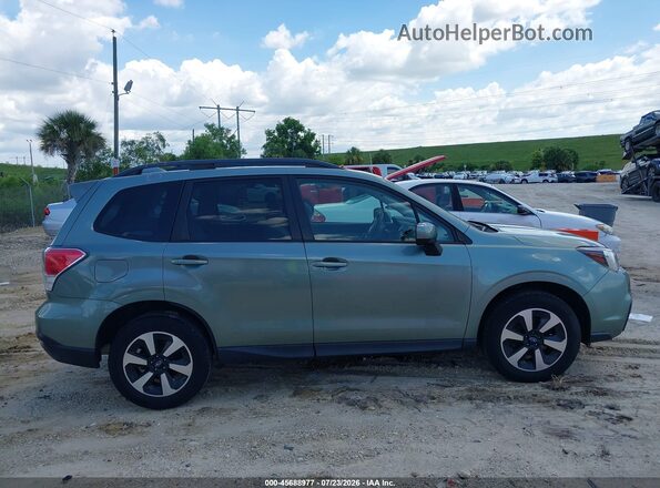JF2SJAEC6JH427556 2018 SUBARU FORESTER Teal Widok wnętrza z tyłu