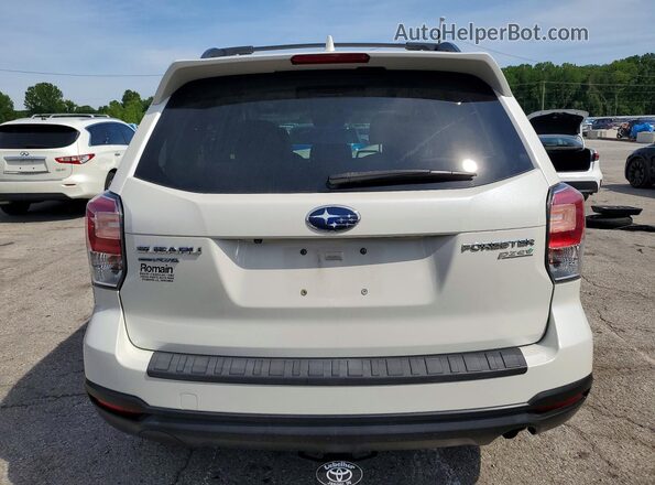 JF2SJAEC7HH416544 2017 SUBARU FORESTER White Rear view