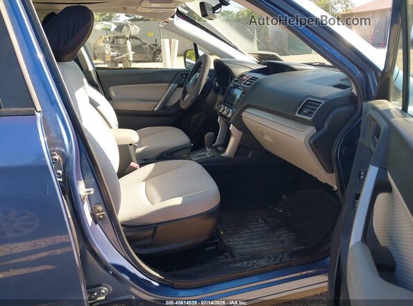 JF2SJAEC9HH803886 2017 SUBARU FORESTER Blue Front interior view