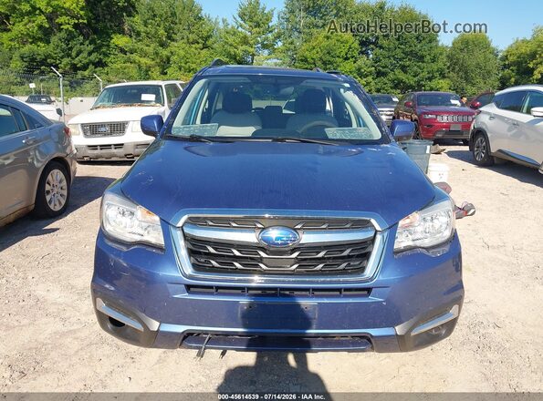 JF2SJAEC9HH803886 2017 SUBARU FORESTER Blue Rear interior view