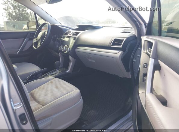 JF2SJAFC3GH563067 2016 SUBARU FORESTER Silver Widok wnętrza z przodu