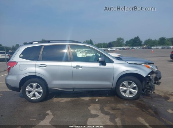 JF2SJAFC4GH498312 2016 SUBARU FORESTER Silver Rear interior view