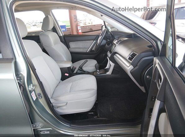 JF2SJAFC6GH431632 2016 SUBARU FORESTER Зеленый Вид салона спереди