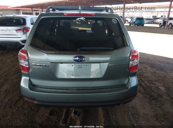 JF2SJAFC6GH431632 2016 SUBARU FORESTER Зеленый 
