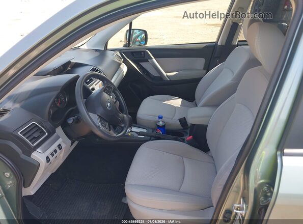 JF2SJAFC9GH568936 2016 SUBARU FORESTER Green Vista interior delantera