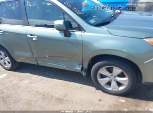 JF2SJAFC9GH568936 2016 SUBARU FORESTER Green Vista frontal