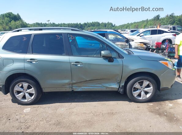 JF2SJAFC9GH568936 2016 SUBARU FORESTER Green Vista interior trasera