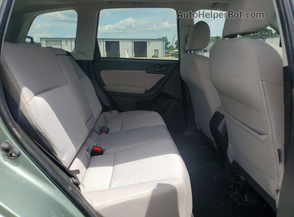JF2SJAGC1GH442293 2016 SUBARU FORESTER Зеленый Вид задней части салона