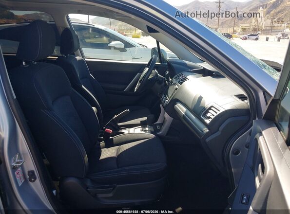 JF2SJAGC2HH494050 2017 SUBARU FORESTER Silver Front interior view