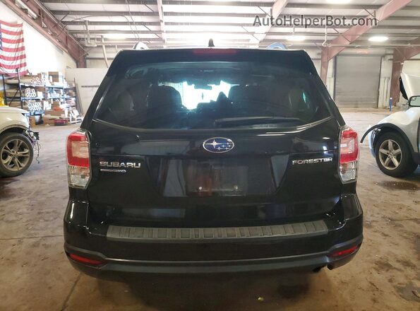 JF2SJAGC3JH486979 2018 SUBARU FORESTER Black Rear view