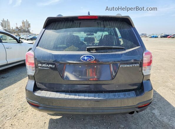 JF2SJAGC3JH553905 2018 SUBARU FORESTER Charcoal Rear view