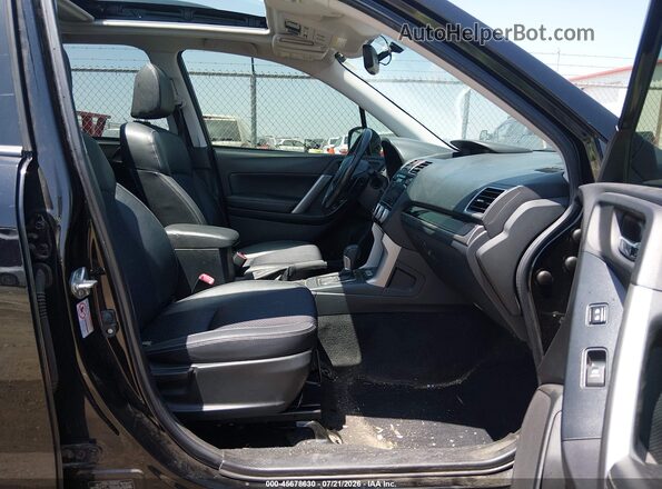 JF2SJAGC5JH549645 2018 SUBARU FORESTER Black Front interior view