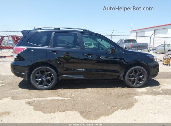 JF2SJAGC5JH549645 2018 SUBARU FORESTER Black Rear interior view