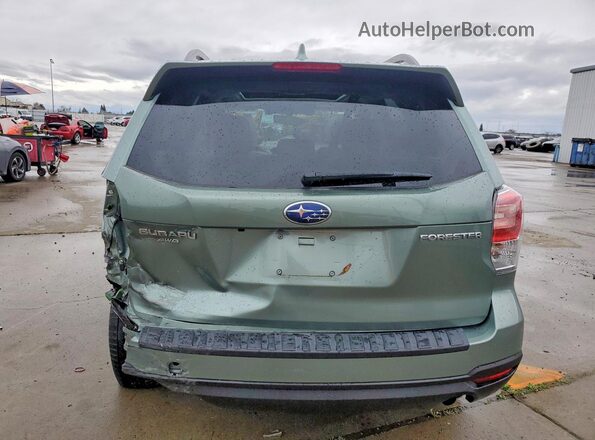 JF2SJAGC6JH480366 2018 SUBARU FORESTER Green Vista trasera