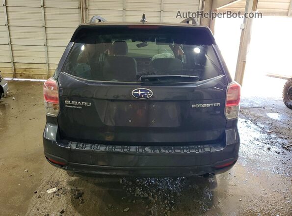 JF2SJAGC7JH525573 2018 SUBARU FORESTER Charcoal Vista trasera
