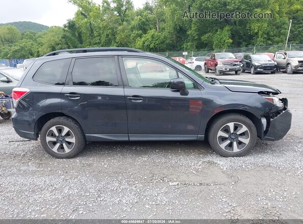 JF2SJAGC9HH555278 2017 SUBARU FORESTER Black Widok wnętrza z tyłu
