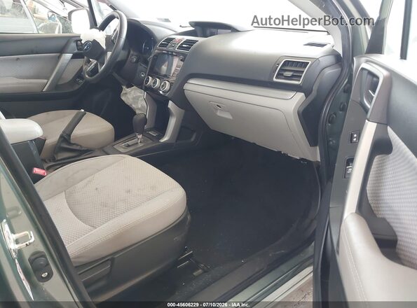 JF2SJAGC9HH804498 2017 SUBARU FORESTER Green წინა სალონის ხედი