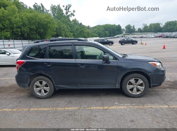 JF2SJAHCXGH415804 2016 SUBARU FORESTER Синий Вид задней части салона