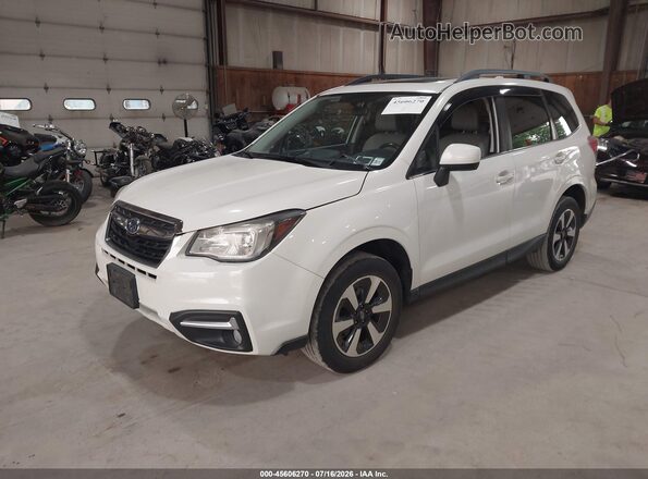 JF2SJAJC0JH550047 2018 SUBARU FORESTER White Front left