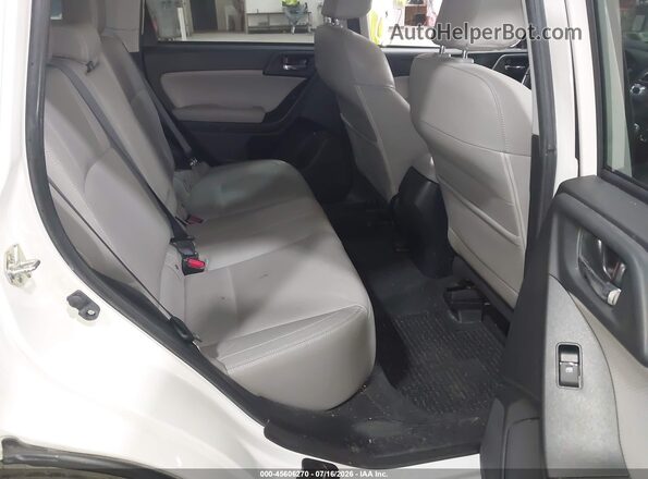 JF2SJAJC0JH550047 2018 SUBARU FORESTER White VIN sticker view