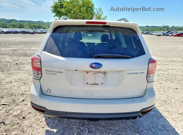 JF2SJAJC3JH445082 2018 SUBARU FORESTER White Rear view