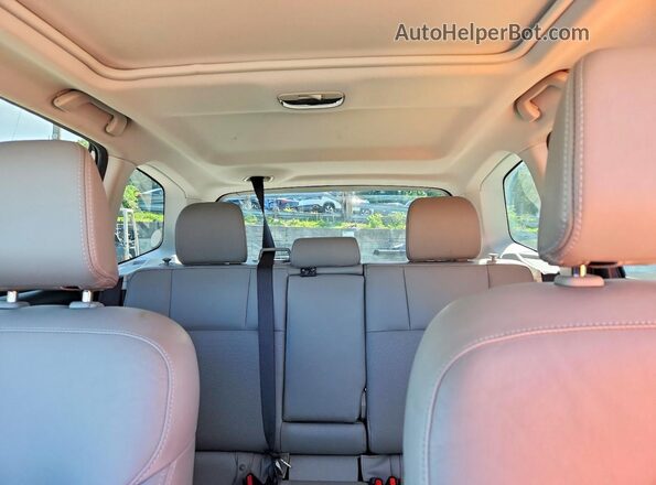 JF2SJAJC3JH583401 2018 SUBARU FORESTER White Vista de los asientos traseros