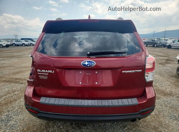 JF2SJAJC7JH527493 2018 SUBARU FORESTER Red Rear view