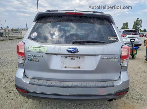 JF2SJAJC8HH527593 2017 SUBARU FORESTER Silver Vista trasera