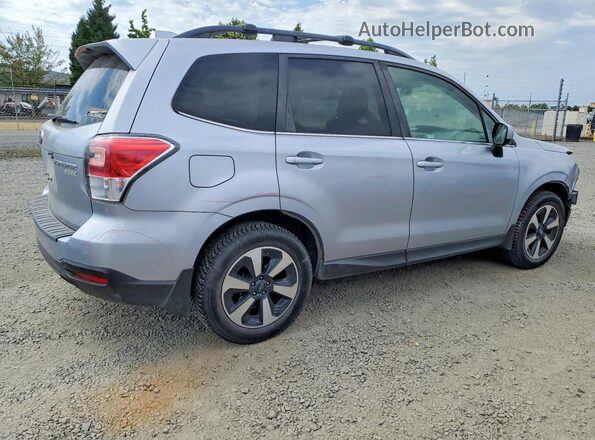 JF2SJAJC8HH527593 2017 SUBARU FORESTER Silver Trasero derecho