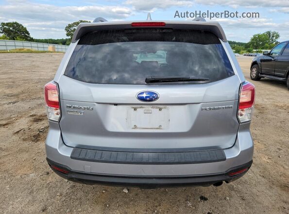 JF2SJAJCXJH478807 2018 SUBARU FORESTER Silver Rear view