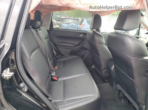 JF2SJAJCXJH616653 2018 SUBARU FORESTER Black Rear interior view