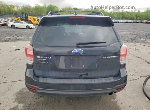 JF2SJAJCXJH616653 2018 SUBARU FORESTER Black Rear view