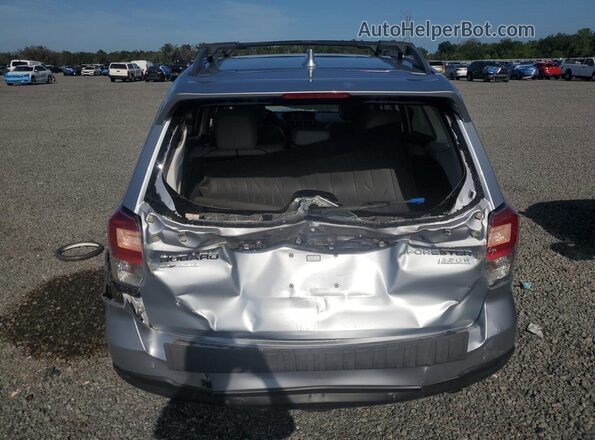 JF2SJARC0HH537572 2017 SUBARU FORESTER Silver Rear view